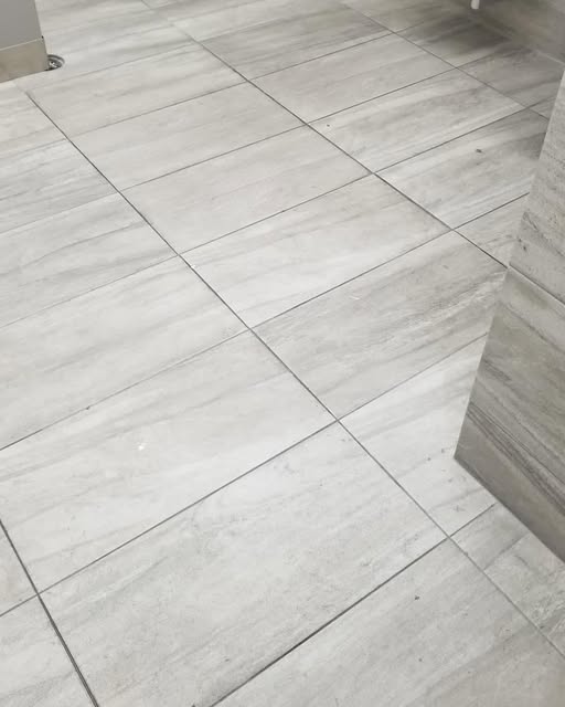 Light marble-look tile floor featured on the Vegas Spotless Instagram profile