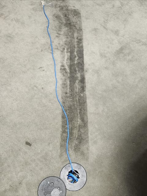 Vegas Spotless carpet cleaning in progress with an extraction machine